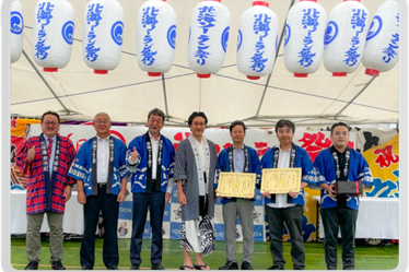 北海道余市町より、「北海ソーラン祭り/花火大会」への寄付に対する感謝状と公益貢献賞を授与された。